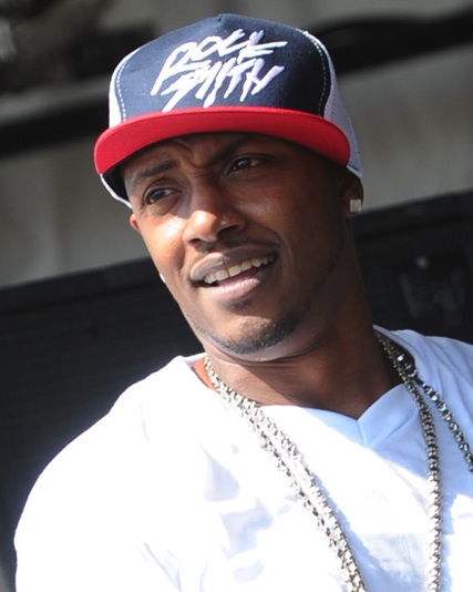 Mystikal in white shirt and hat