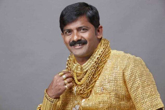 The man with the golden shirt